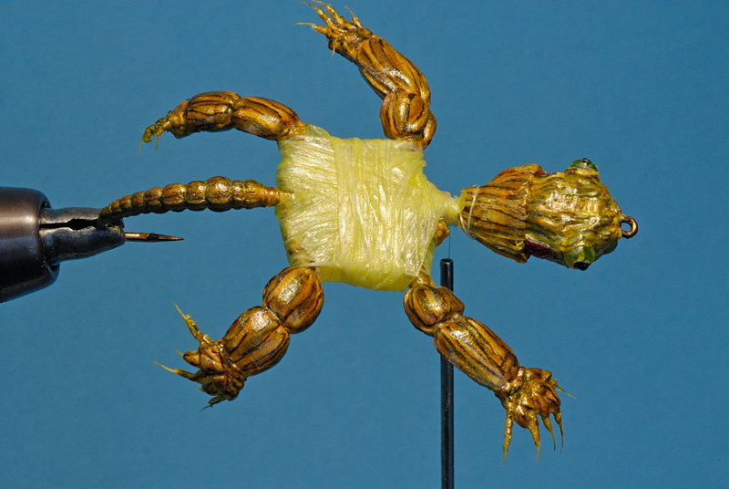 Raffia is wrapped around the thread base